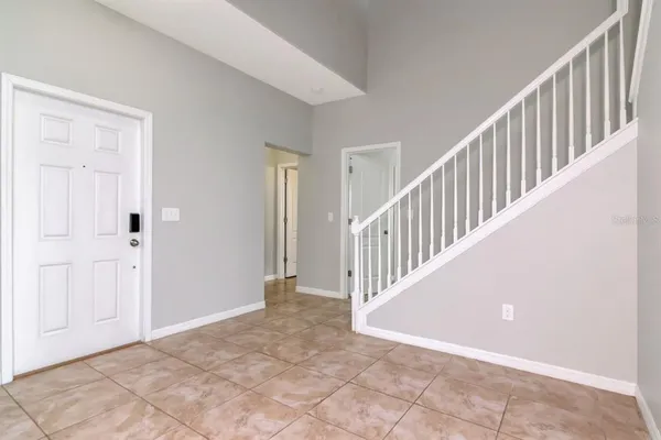 a view of an entryway with staircase