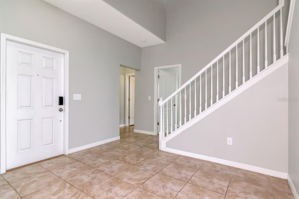 13939 Felix Will Road Riverview, FL 33579 - Photo 3 of 47 a view of an entryway with staircase