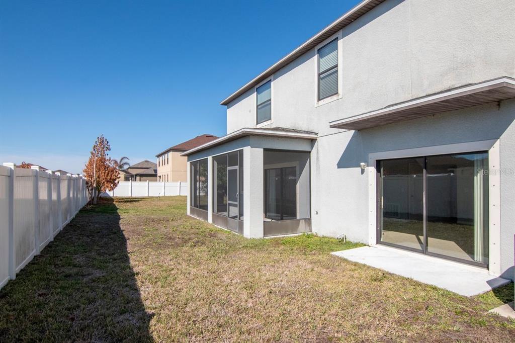 13939 Felix Will Road Riverview, FL 33579 - Photo 35 of 47 a view of a house with backyard porch