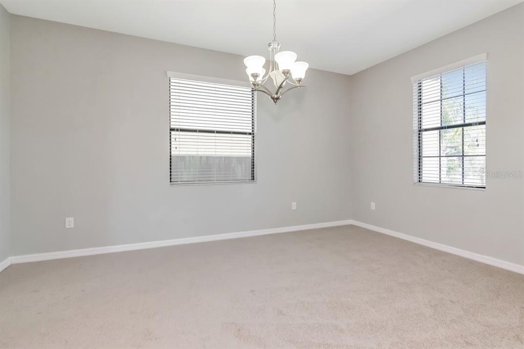 13939 Felix Will Road Riverview, FL 33579 - Photo 5 of 47 a view of an empty room with a window