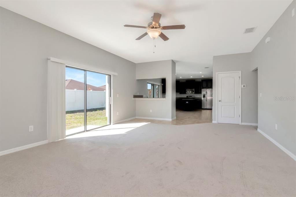 13939 Felix Will Road Riverview, FL 33579 - Photo 8 of 47 a view of an empty room with a window
