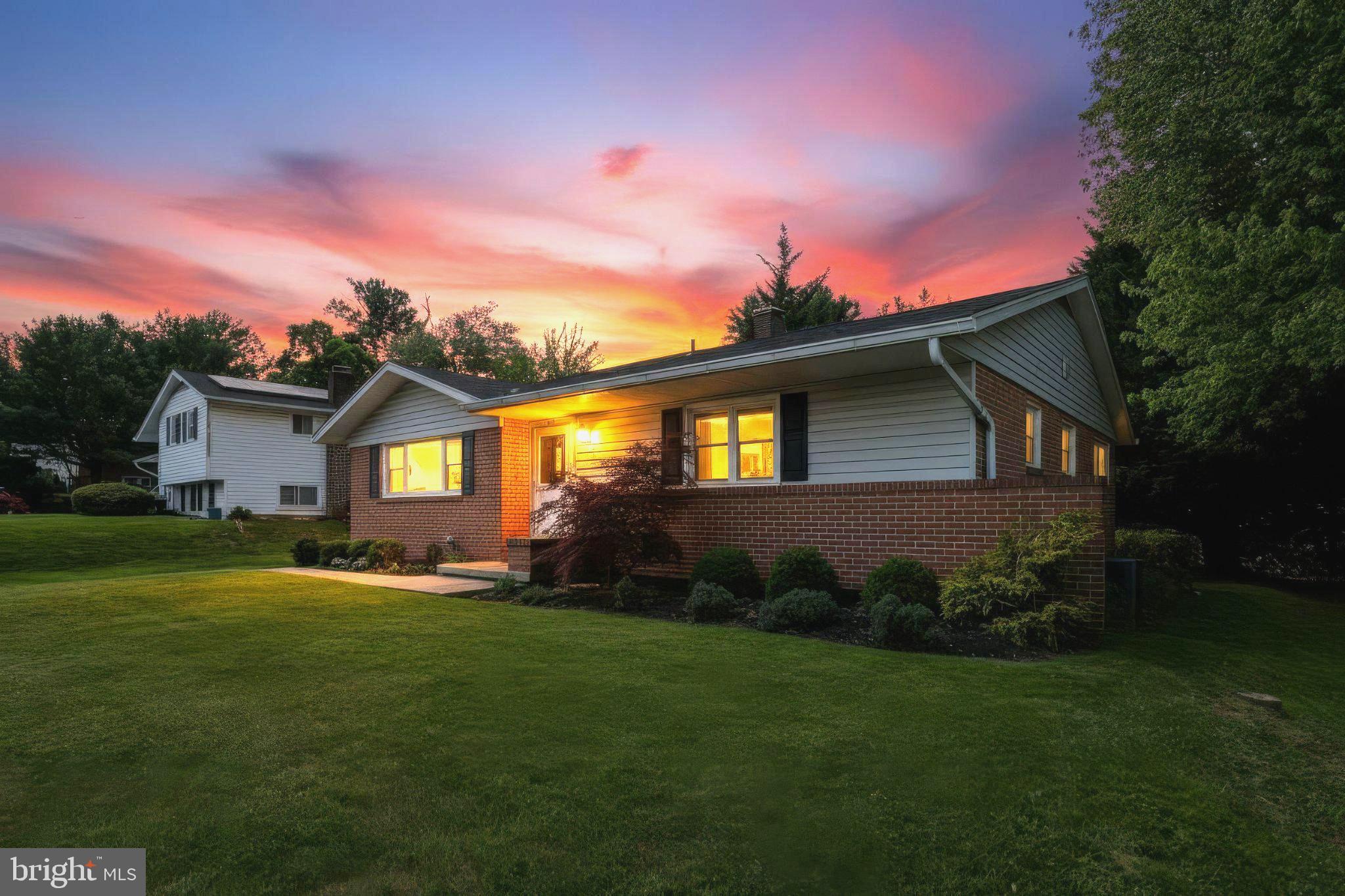 8145 Scotts Level Road Pikesville, MD 21208 - Photo 45 of 45 Charming home under a vibrant sunset.