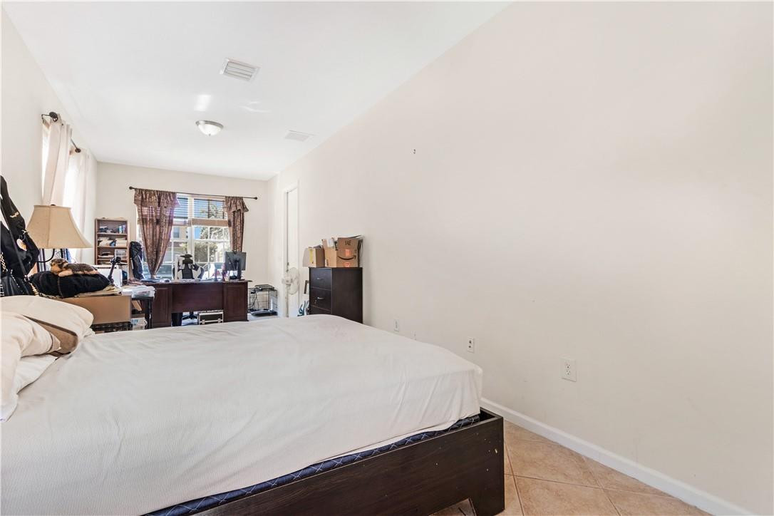 4611 Southwest 131st Terrace Miramar, FL 33027 - Photo 14 of 66 Downstairs Bedroom