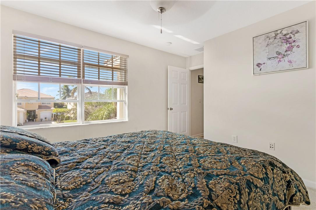 4611 Southwest 131st Terrace Miramar, FL 33027 - Photo 22 of 66 a view of a bedroom