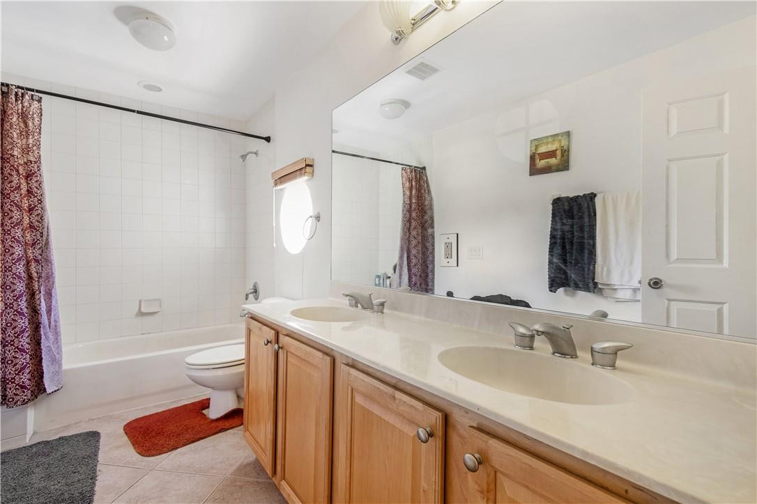 4611 Southwest 131st Terrace Miramar, FL 33027 - Photo 31 of 66 a bathroom with a sink toilet tub and shower