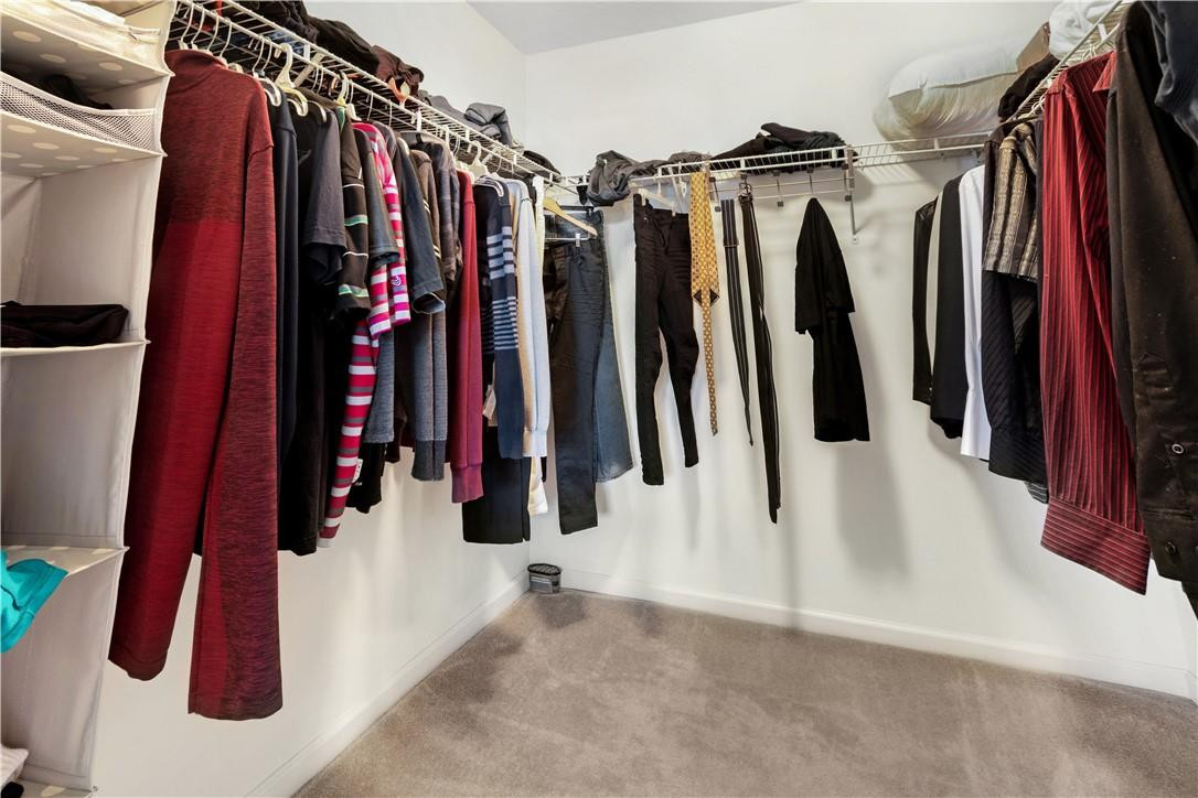 4611 Southwest 131st Terrace Miramar, FL 33027 - Photo 37 of 66 a view of walk in closet with clothes and shoes