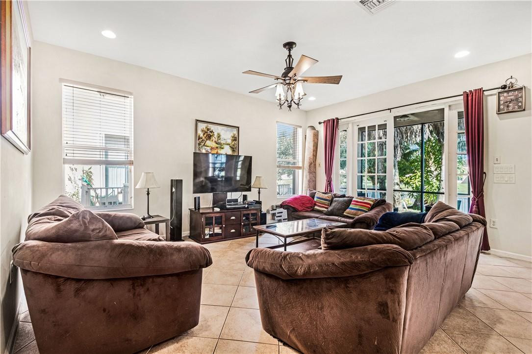 4611 Southwest 131st Terrace Miramar, FL 33027 - Photo 4 of 66 a living room with furniture and a large window