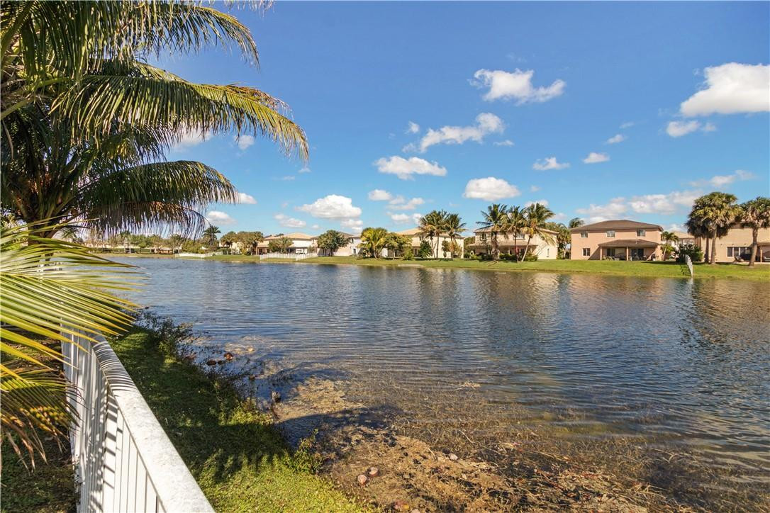 4611 Southwest 131st Terrace Miramar, FL 33027 - Photo 47 of 66 a view of a lake with outdoor space