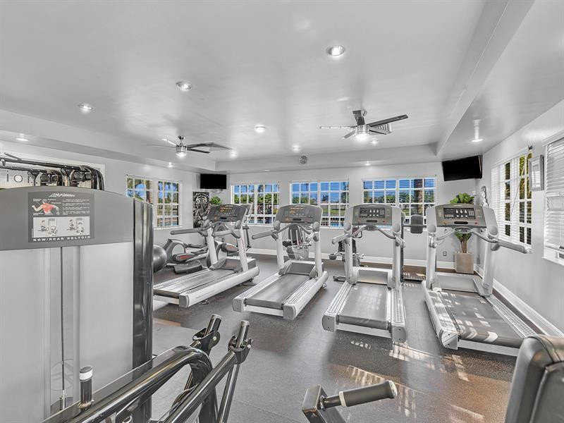 4611 Southwest 131st Terrace Miramar, FL 33027 - Photo 60 of 66 a large room with lots of gym equipment