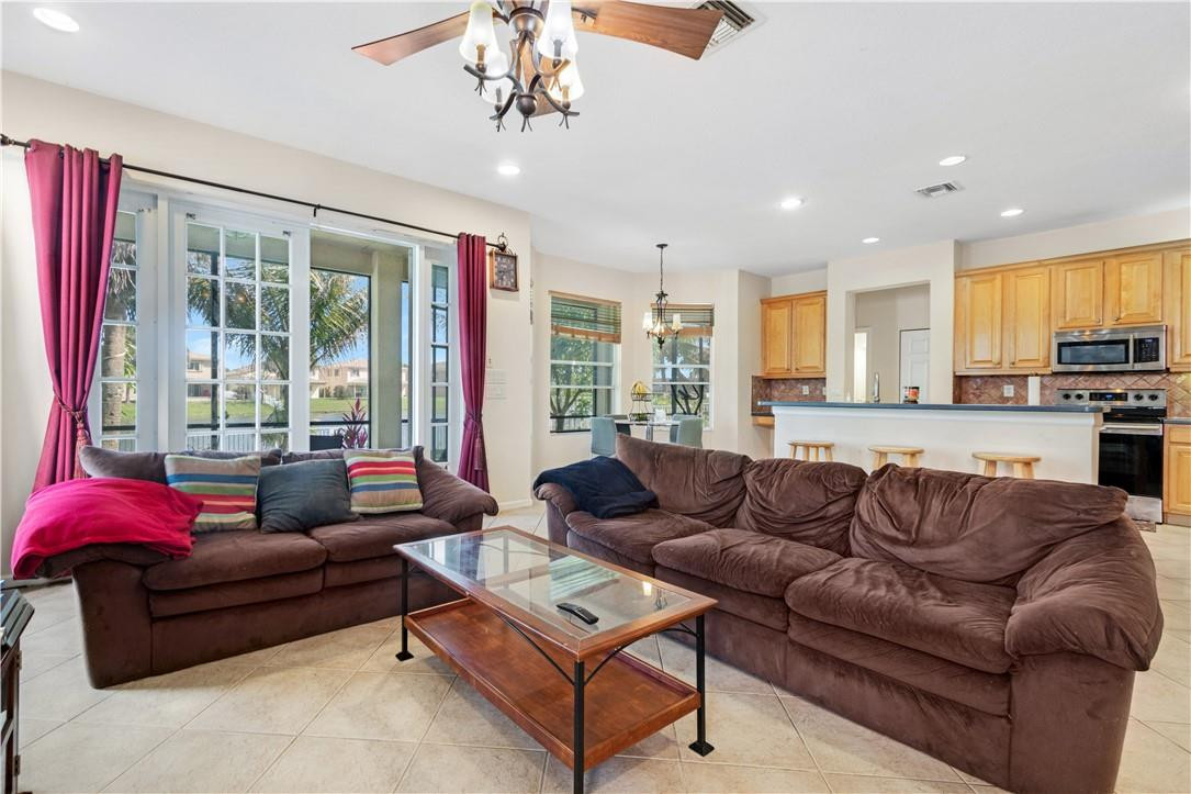 4611 Southwest 131st Terrace Miramar, FL 33027 - Photo 6 of 66 a living room with furniture and a large window