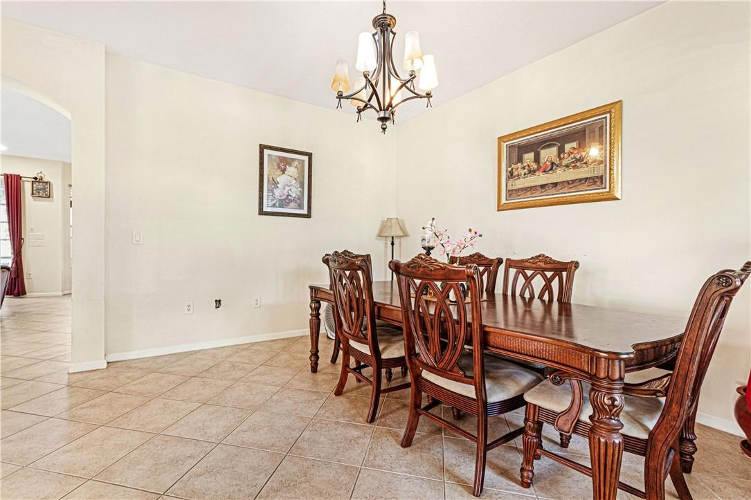 4611 Southwest 131st Terrace Miramar, FL 33027 - Photo 7 of 66 a view of a dining room with furniture