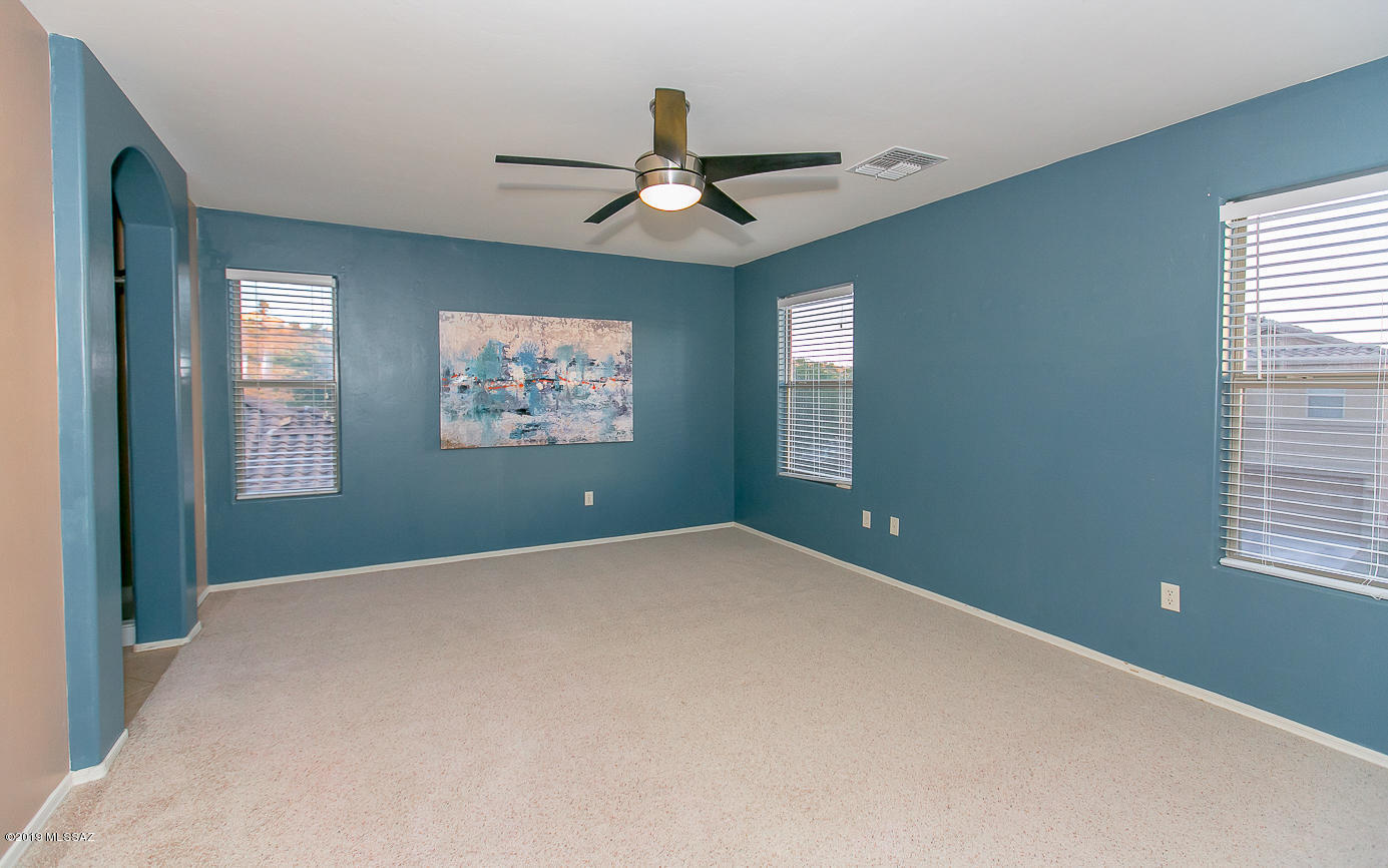 39103 Winners Circle Tucson, AZ 85739 - Photo 6 of 19 a view of an empty room with a window