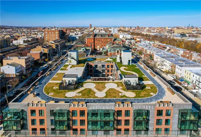 a view of a lake with building in front of it