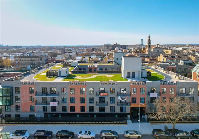 a large building with a swimming pool
