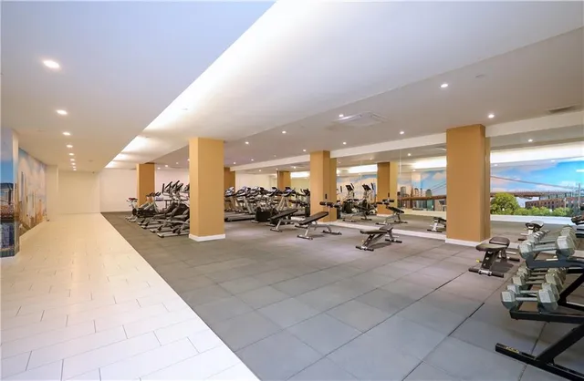 a lobby with furniture and a table