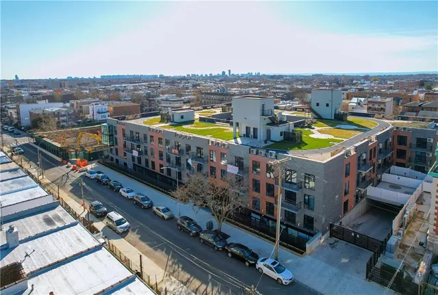 a view of a balcony with city view