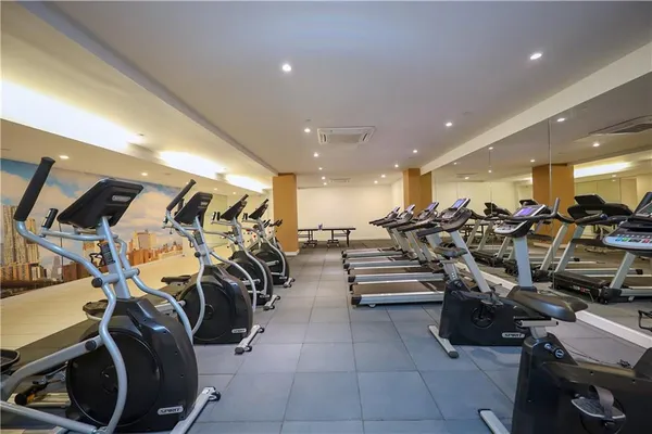 a view of a room with gym equipment