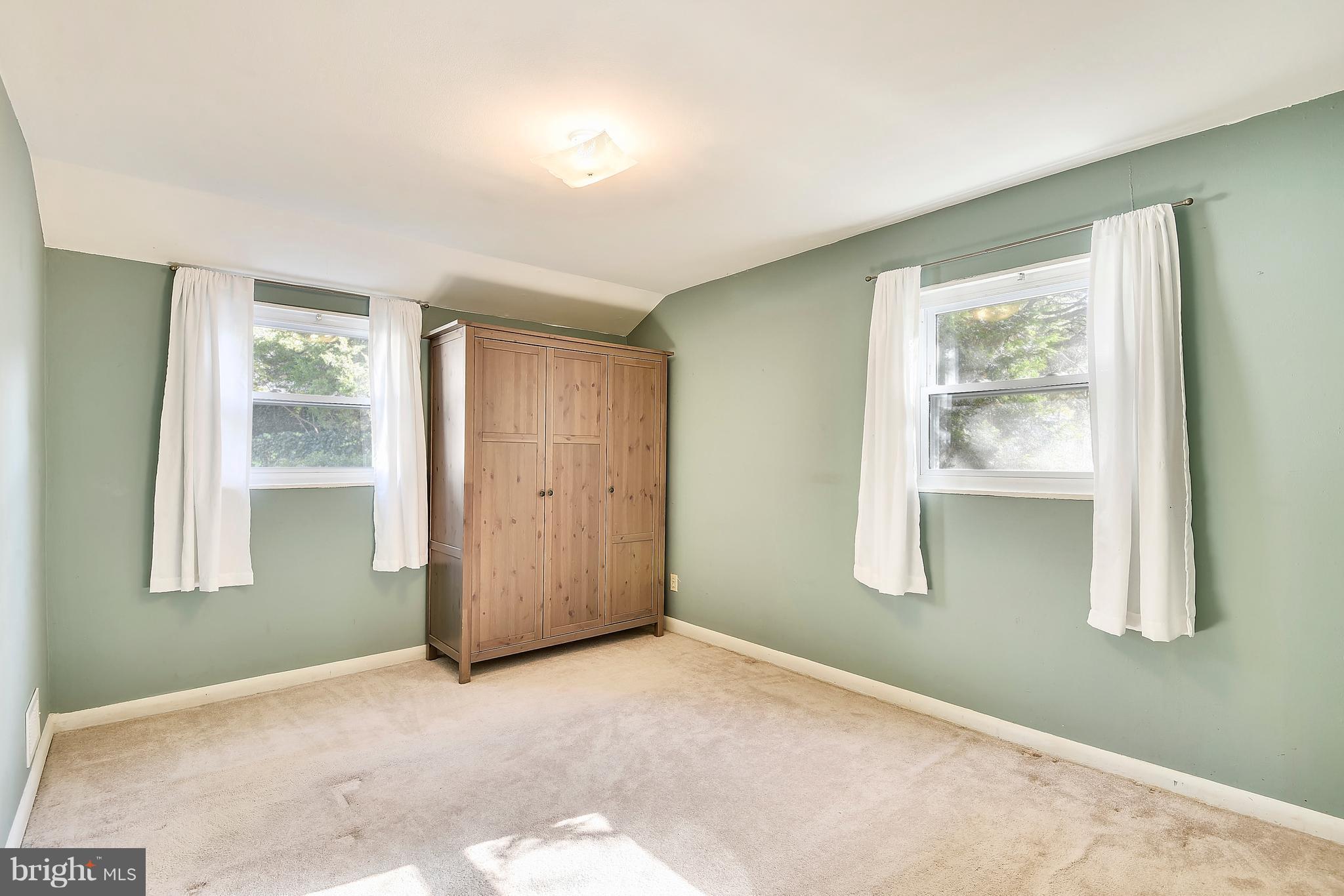 3006 Weller Road Silver Spring, MD 20906 - Photo 12 of 18 a view of an empty room with a window