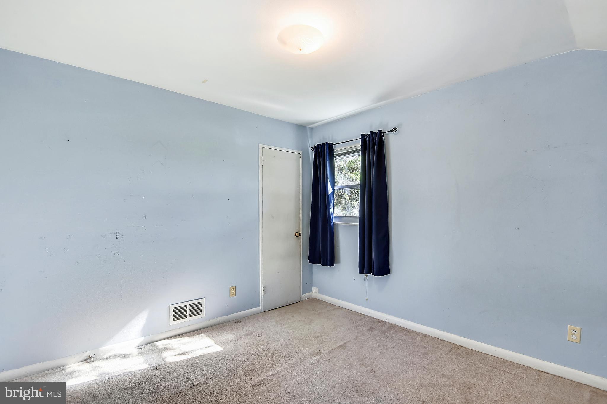 3006 Weller Road Silver Spring, MD 20906 - Photo 14 of 18 an empty room with windows