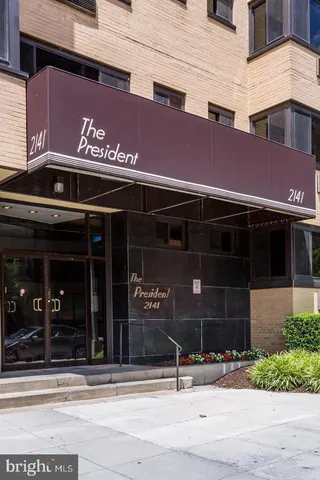 a front view of a building with street