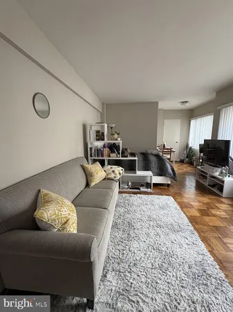 a living room with furniture or couch and a flat screen tv