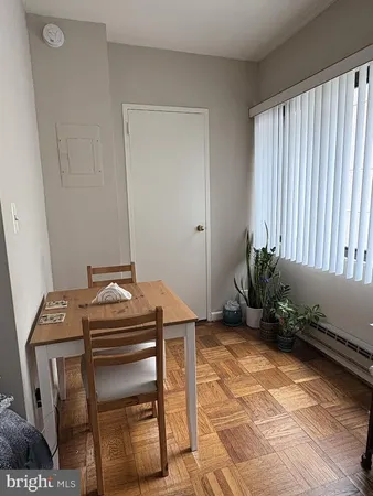 a view of a workspace with furniture