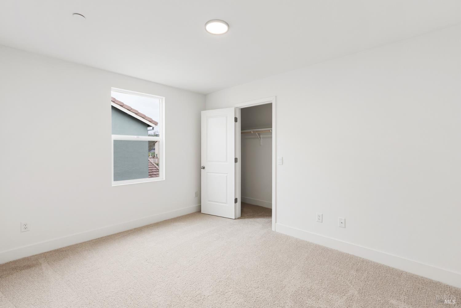 2158 Owens Place Rohnert Park, CA 94928 - Photo 14 of 28 an empty room with a empty space and windows