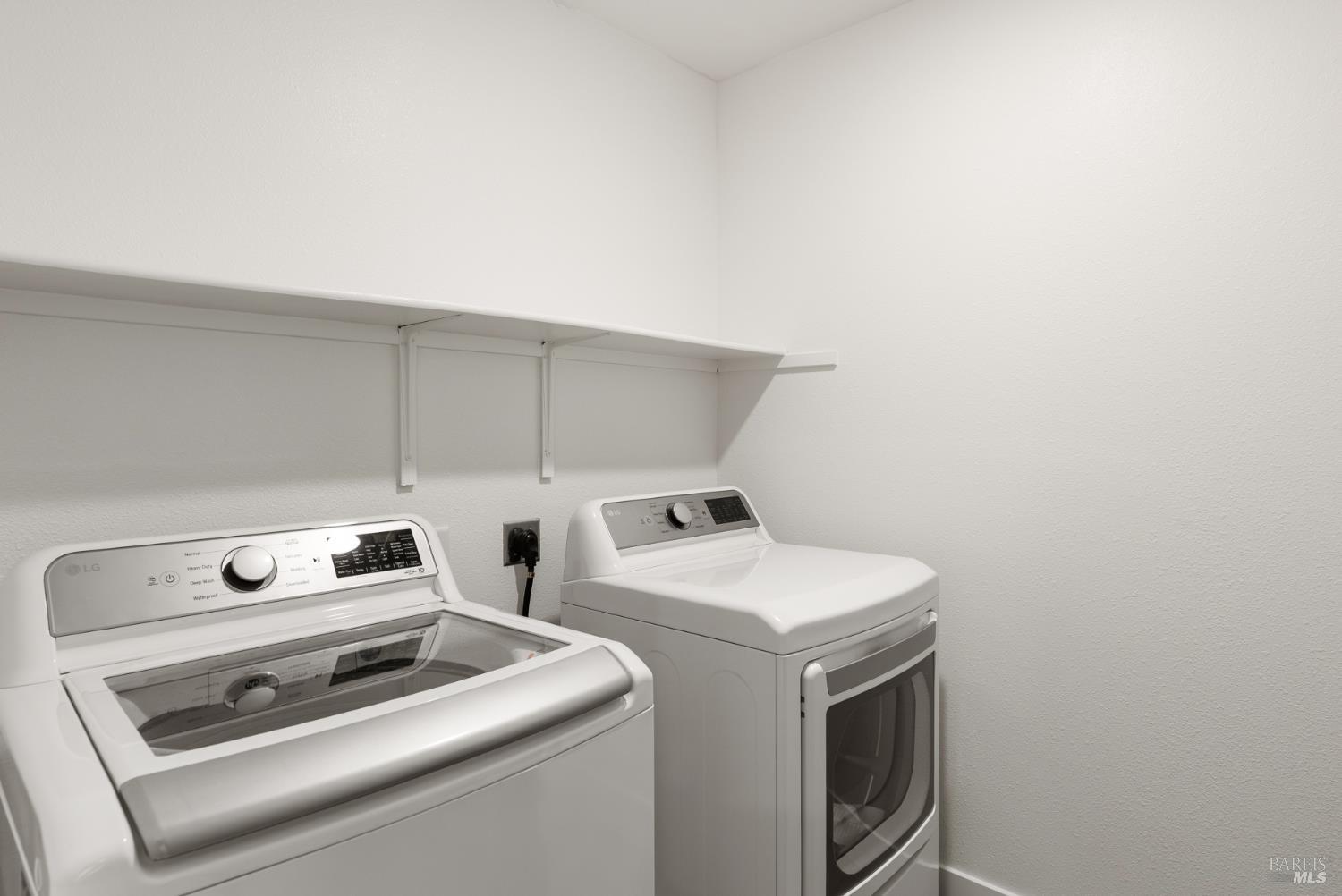 2158 Owens Place Rohnert Park, CA 94928 - Photo 20 of 28 a utility room with dryer and washer