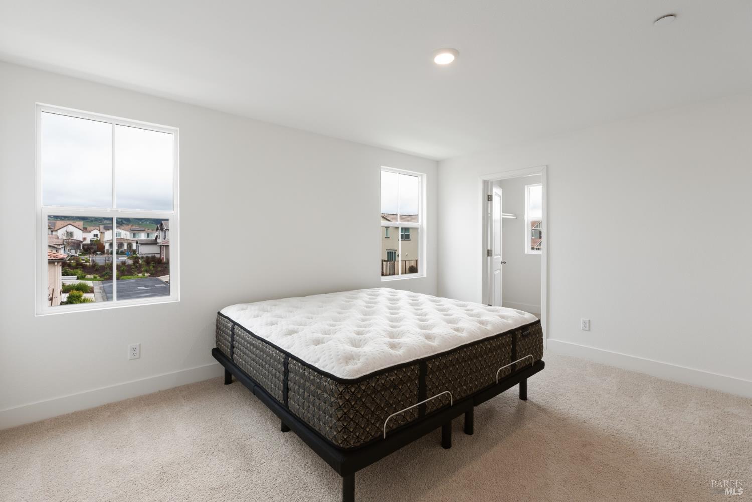 2158 Owens Place Rohnert Park, CA 94928 - Photo 21 of 28 a bed sitting in a spacious bedroom next to a window