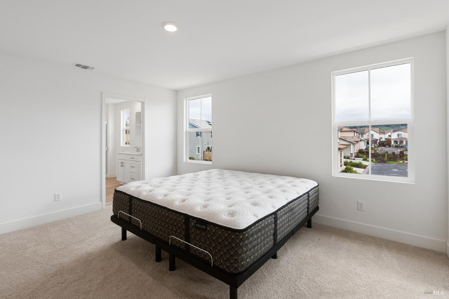 2158 Owens Place Rohnert Park, CA 94928 - Photo 22 of 28 a bed sitting in a spacious bedroom next to a window