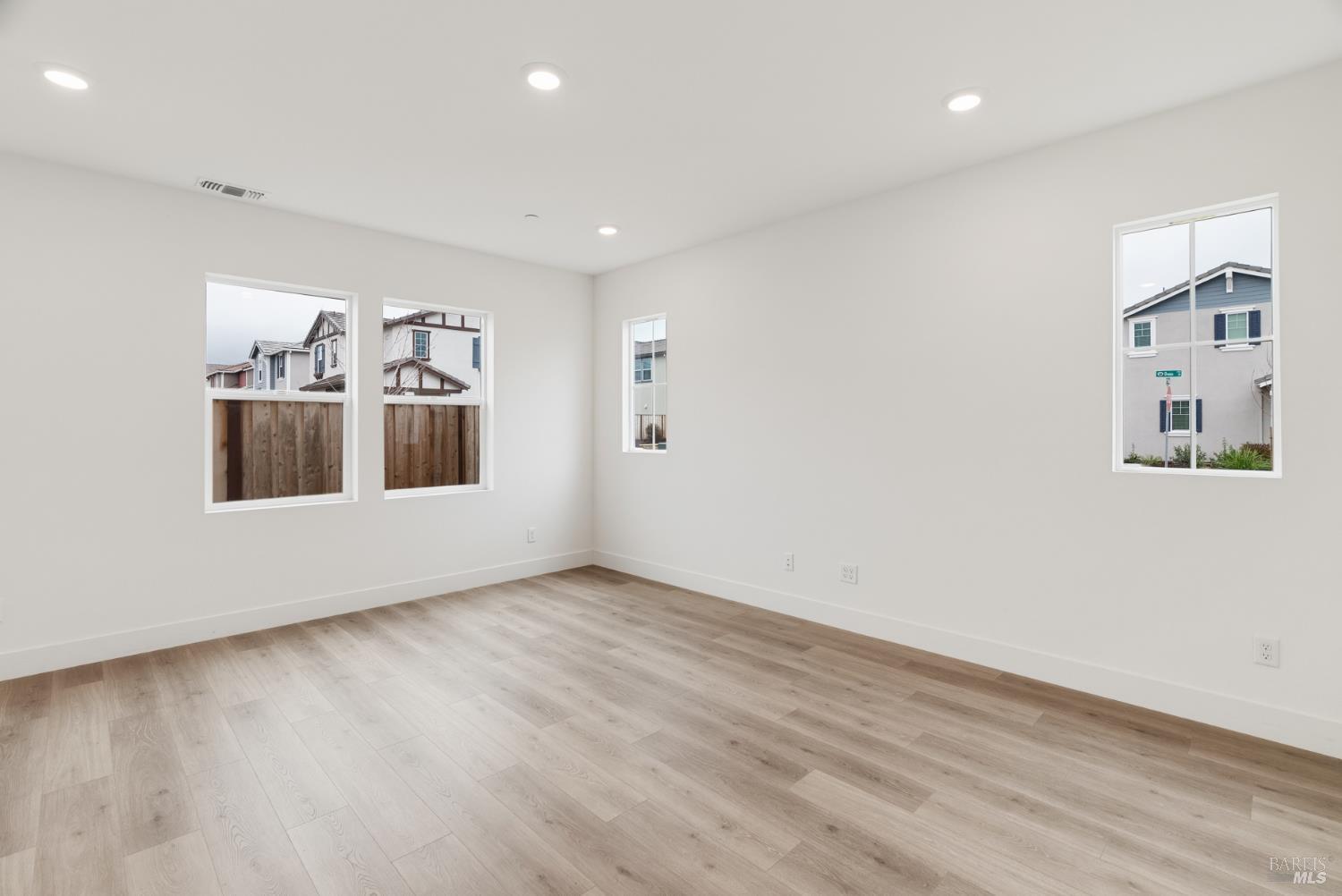 2158 Owens Place Rohnert Park, CA 94928 - Photo 7 of 28 a view of a big room with wooden floor and windows