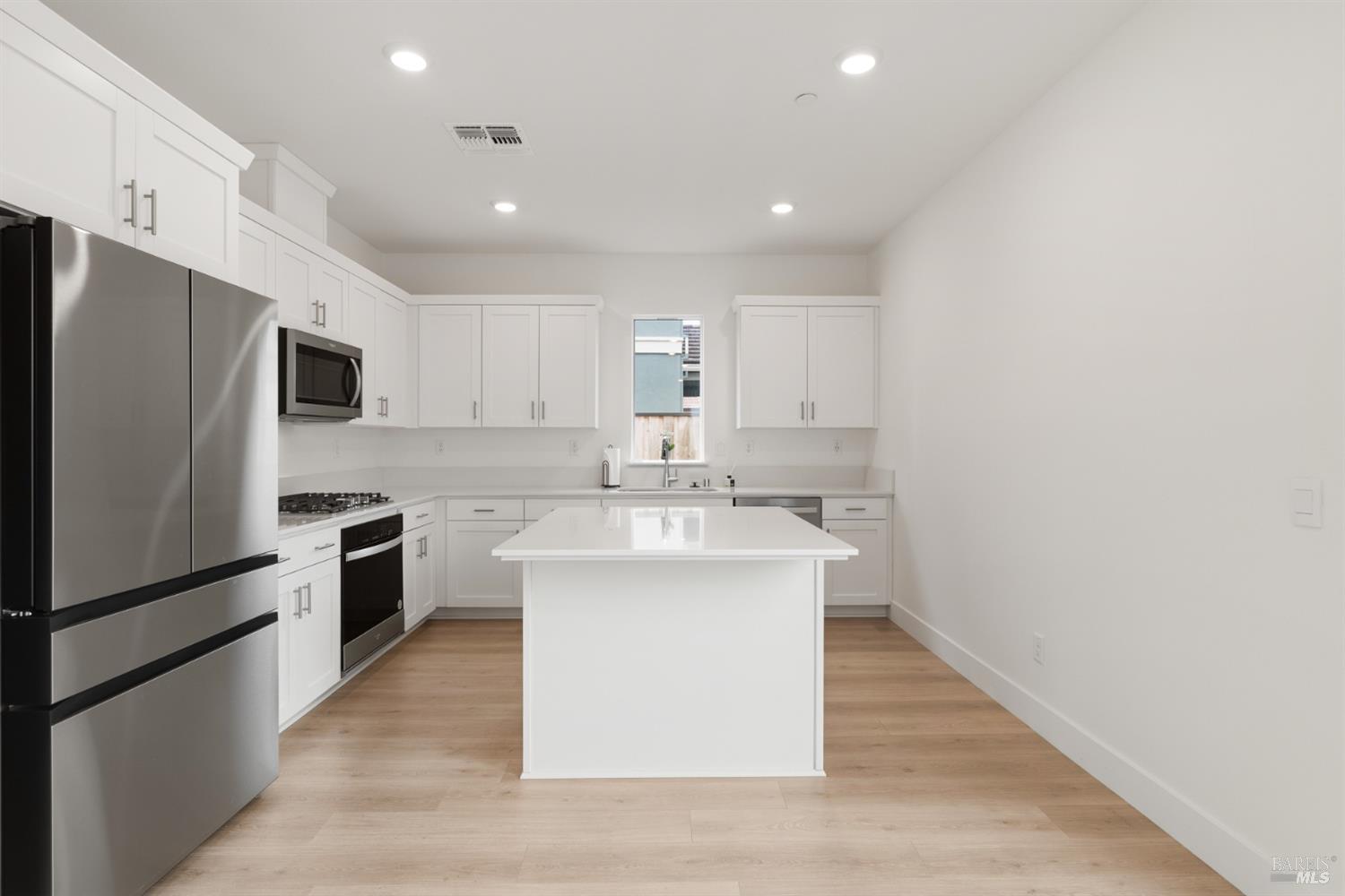 2158 Owens Place Rohnert Park, CA 94928 - Photo 10 of 28 a kitchen with stainless steel appliances a sink stove and refrigerator