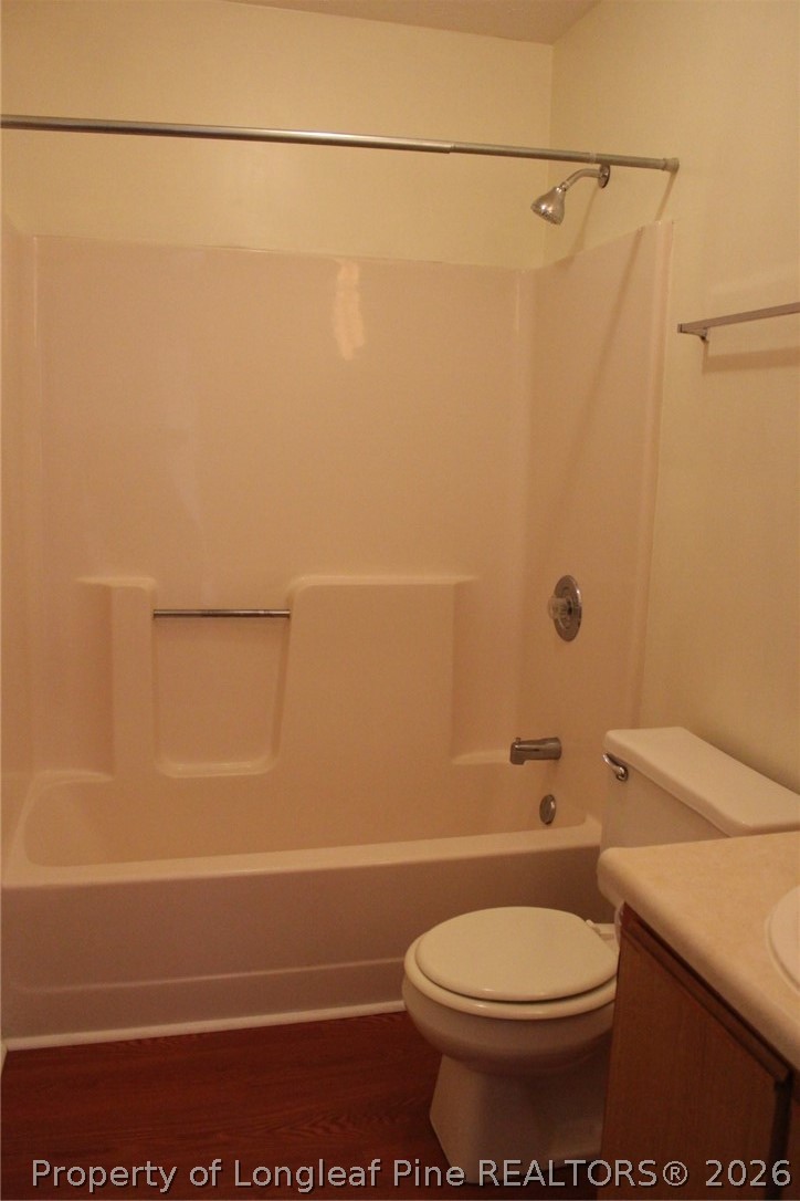 7805 Gallant Ridge Drive Fayetteville, NC 28314 - Photo 18 of 25 a bathroom with a toilet and a shower