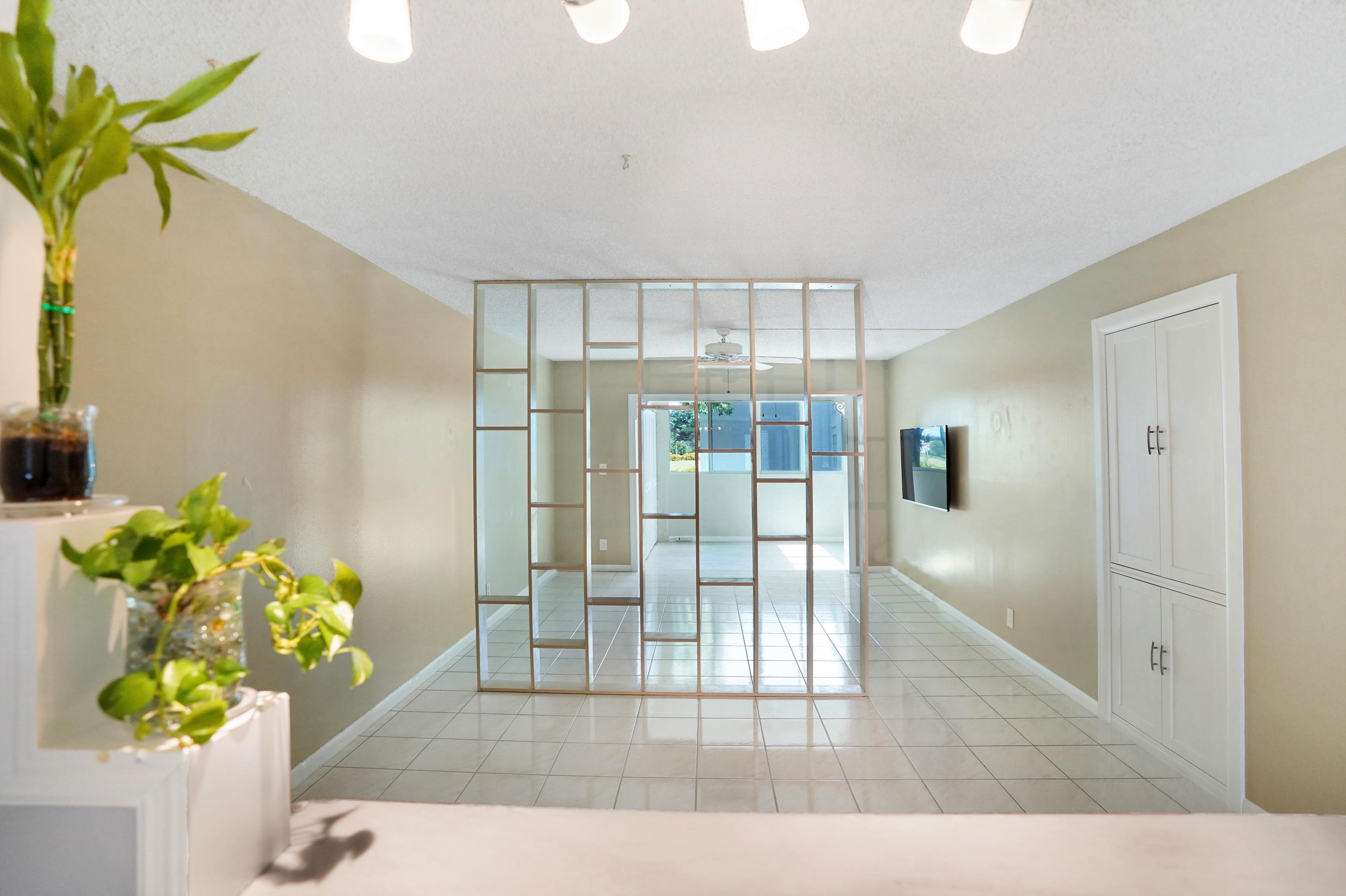 9440 Southwest 8th Street, Unit 206 Boca Raton, FL 33428 - Photo 4 of 28 Open Plan Living / Dining