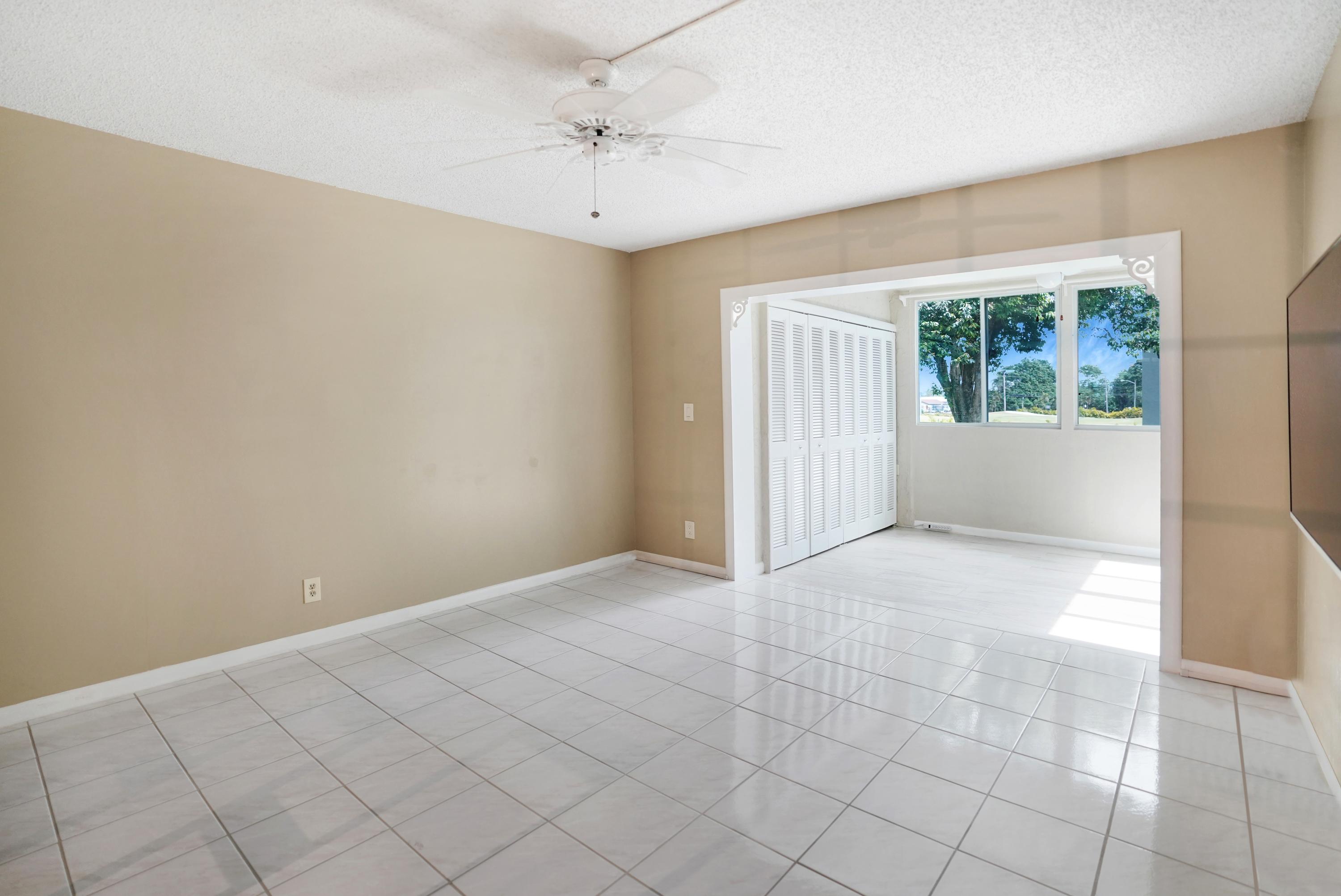 9440 Southwest 8th Street, Unit 206 Boca Raton, FL 33428 - Photo 5 of 28 Extended Living Area