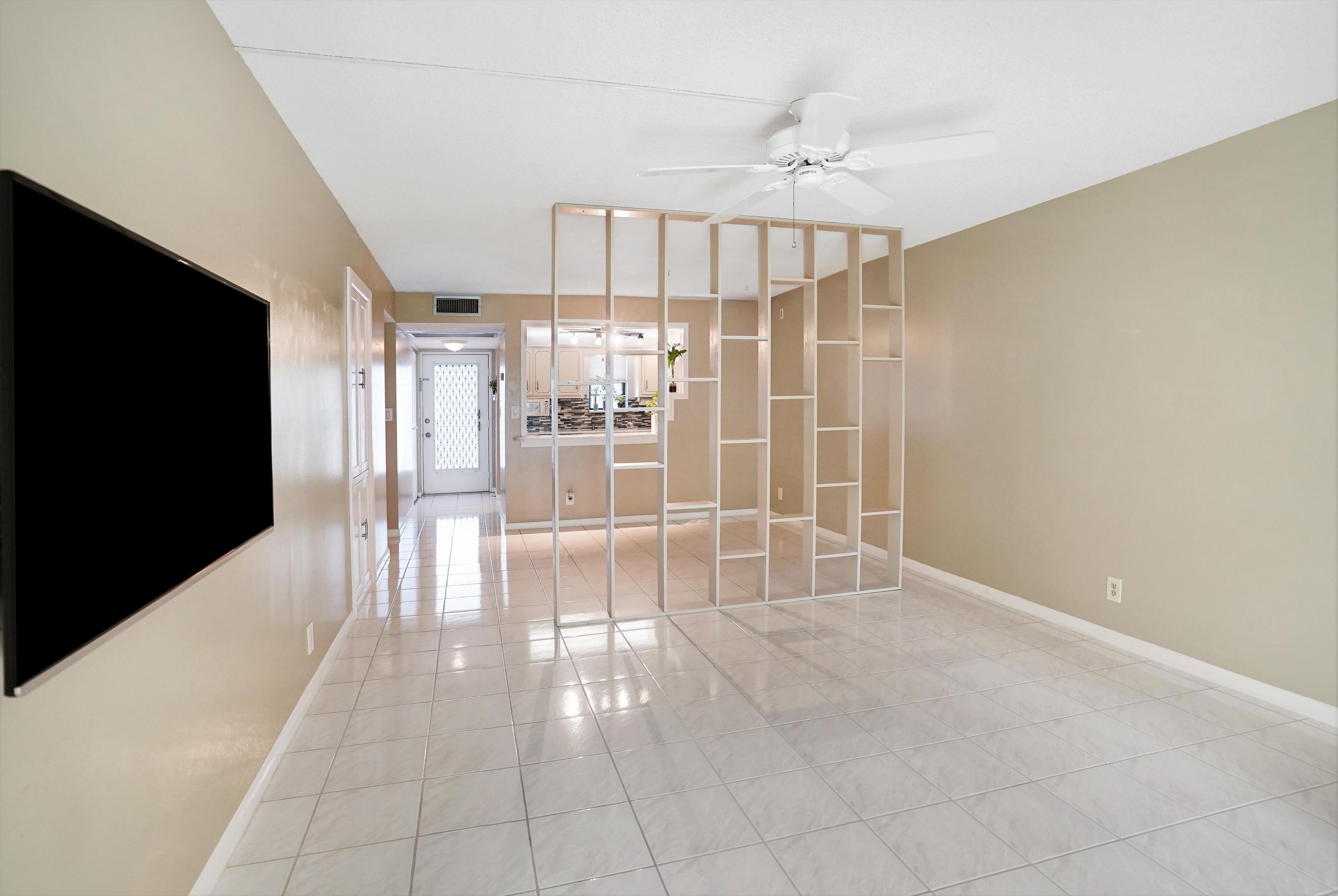 9440 Southwest 8th Street, Unit 206 Boca Raton, FL 33428 - Photo 6 of 28 Open Plan Living / Dining Area