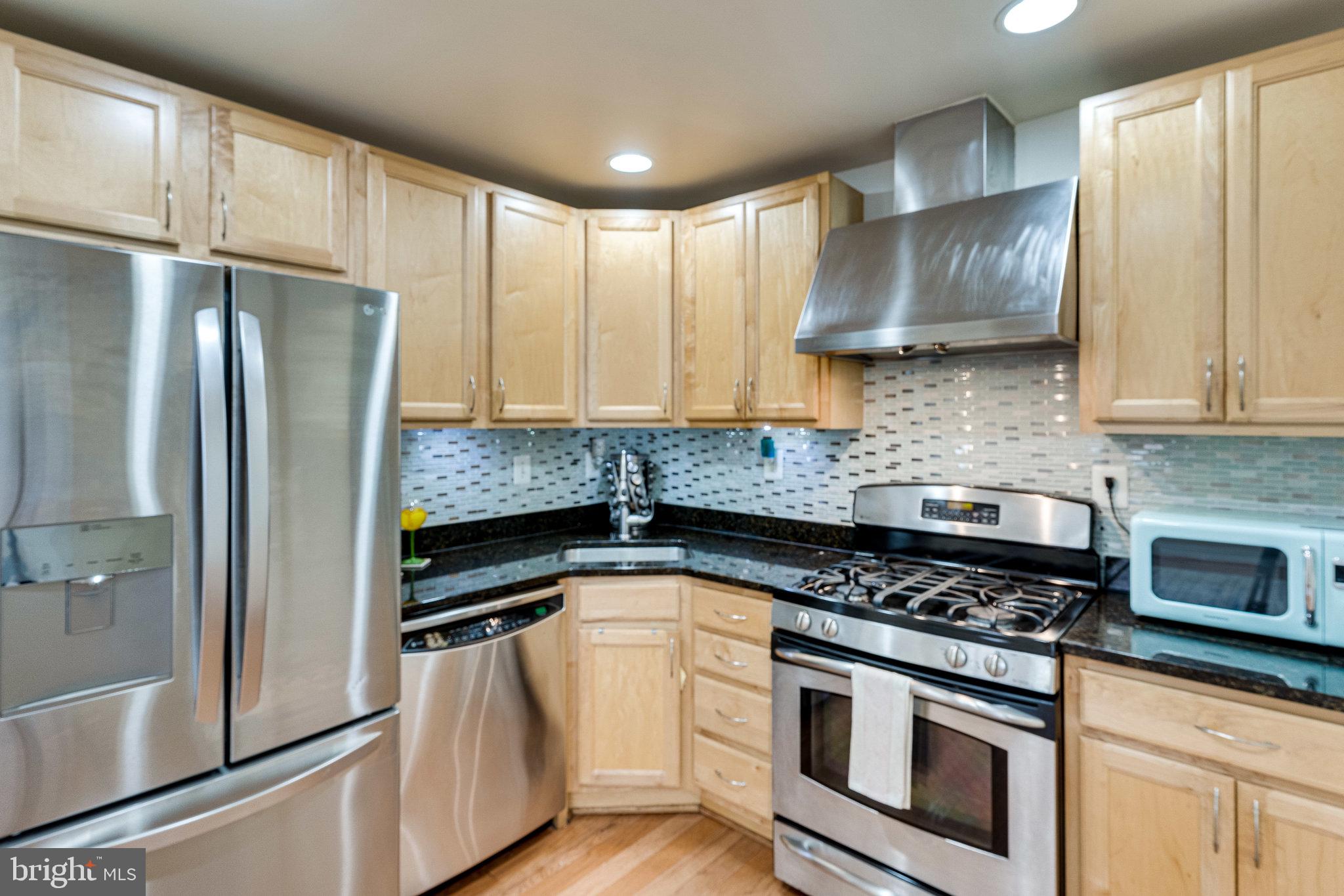 1437 Spring Road Northwest, Unit 21 Washington, DC 20010 - Photo 12 of 28 Kitchen with Granite Countertops