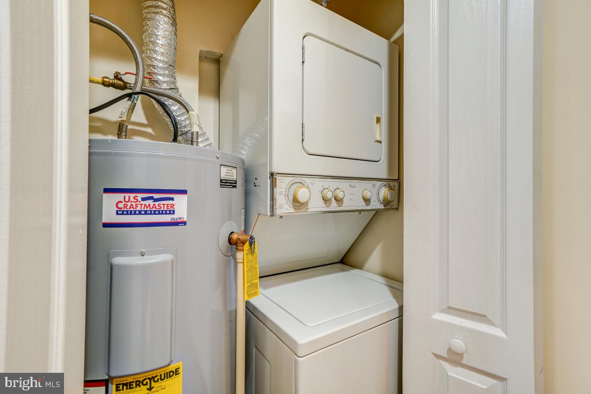 1437 Spring Road Northwest, Unit 21 Washington, DC 20010 - Photo 24 of 28 Hot Water Heater and Stackable Washer and Dryer