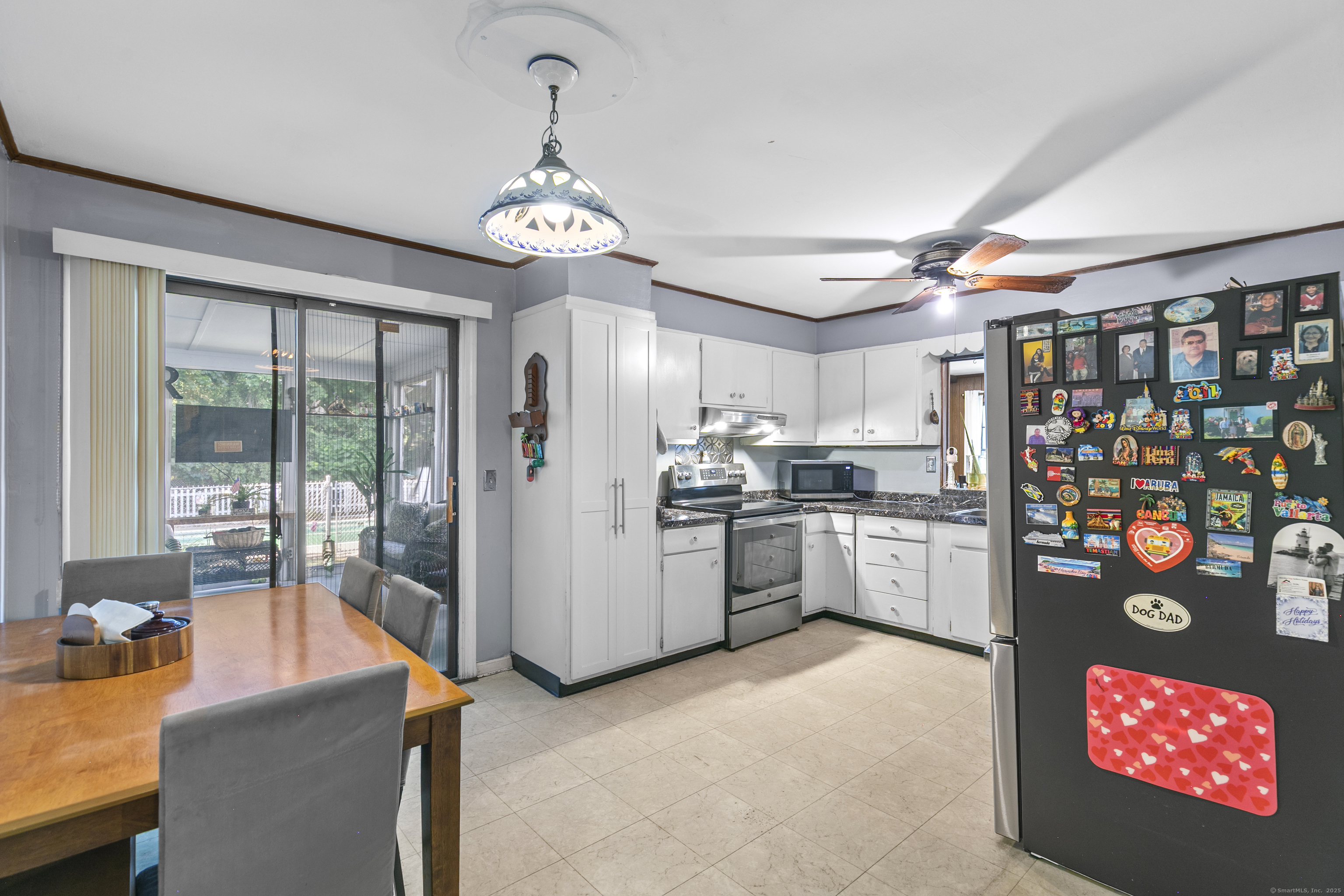 66 Loftus Circle Trumbull, CT 06611 - Photo 13 of 40 a open kitchen with stainless steel appliances granite countertop a stove refrigerator and cabinets