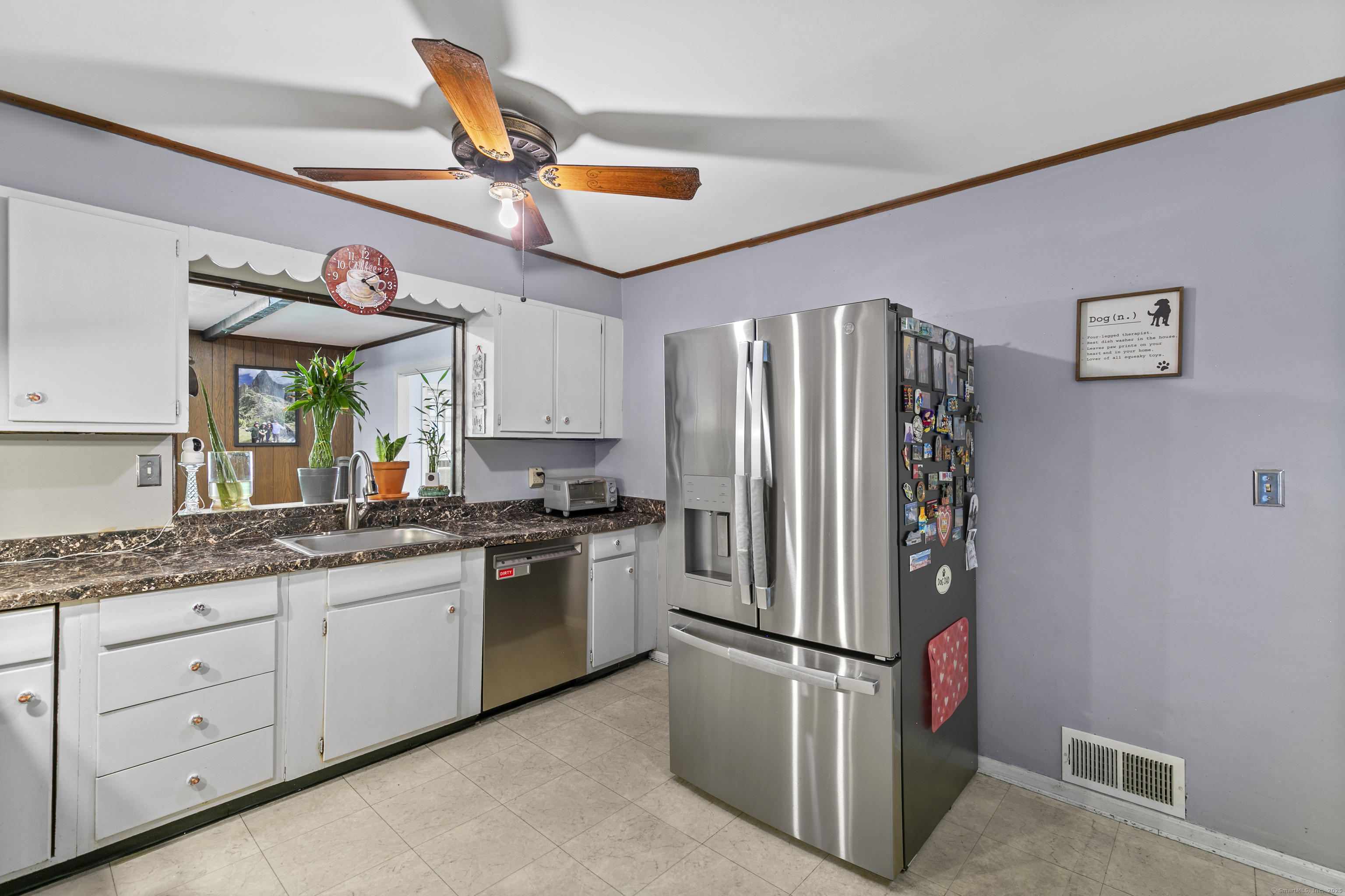 66 Loftus Circle Trumbull, CT 06611 - Photo 17 of 40 a kitchen with stainless steel appliances granite countertop a refrigerator and a sink