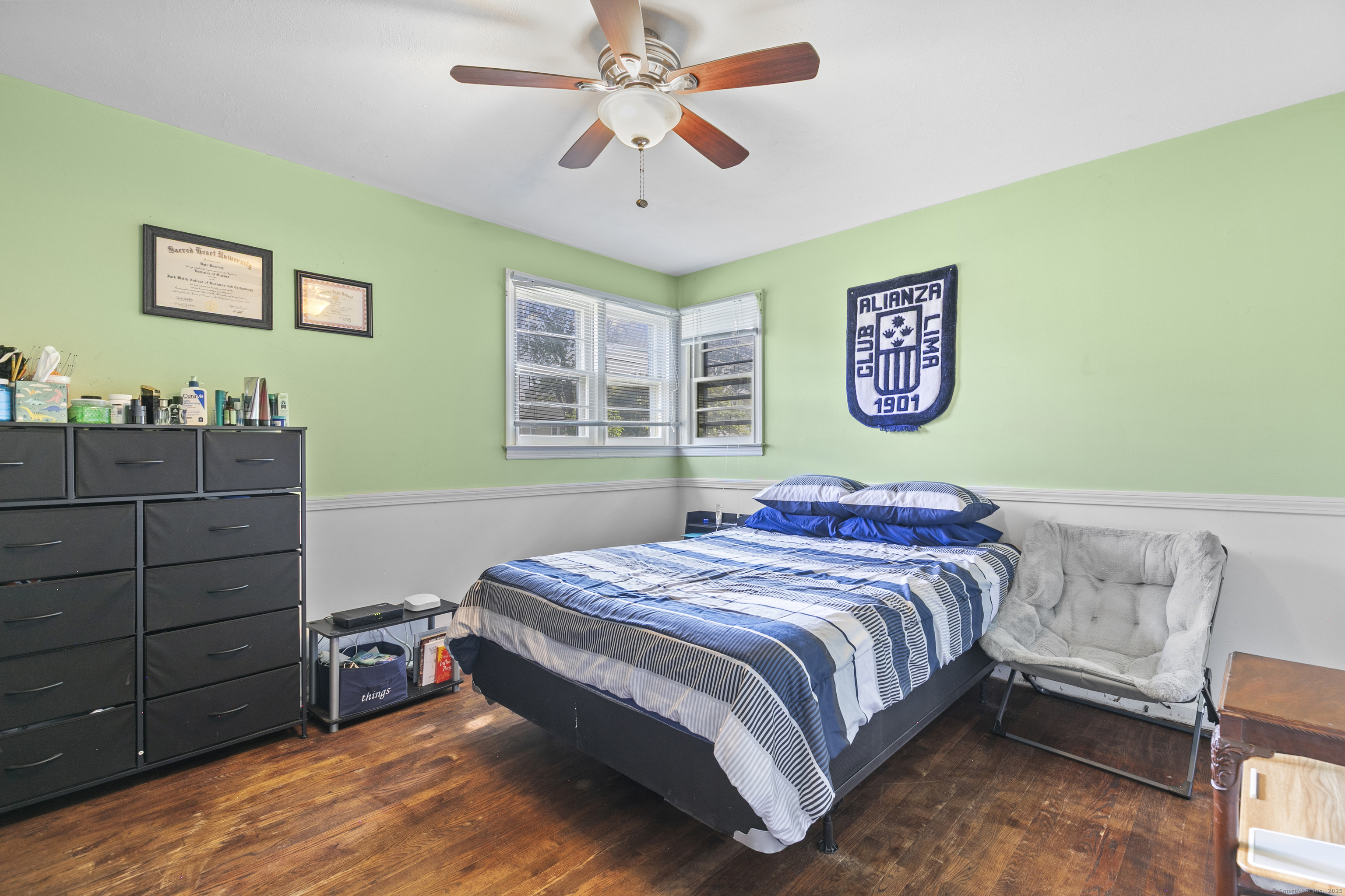 66 Loftus Circle Trumbull, CT 06611 - Photo 18 of 40 a bedroom with a bed and a dresser