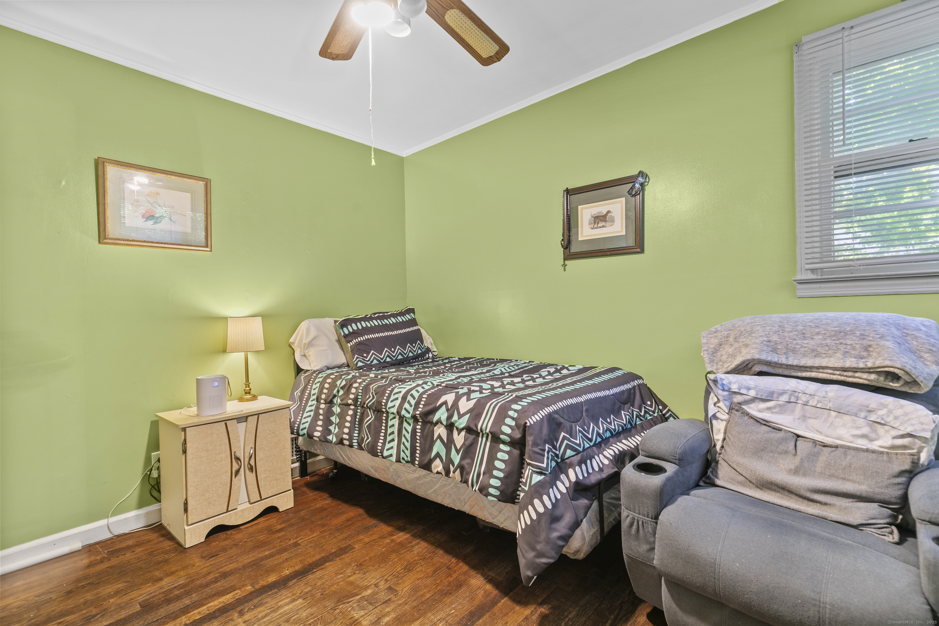 66 Loftus Circle Trumbull, CT 06611 - Photo 21 of 40 a bedroom with a bed and a window
