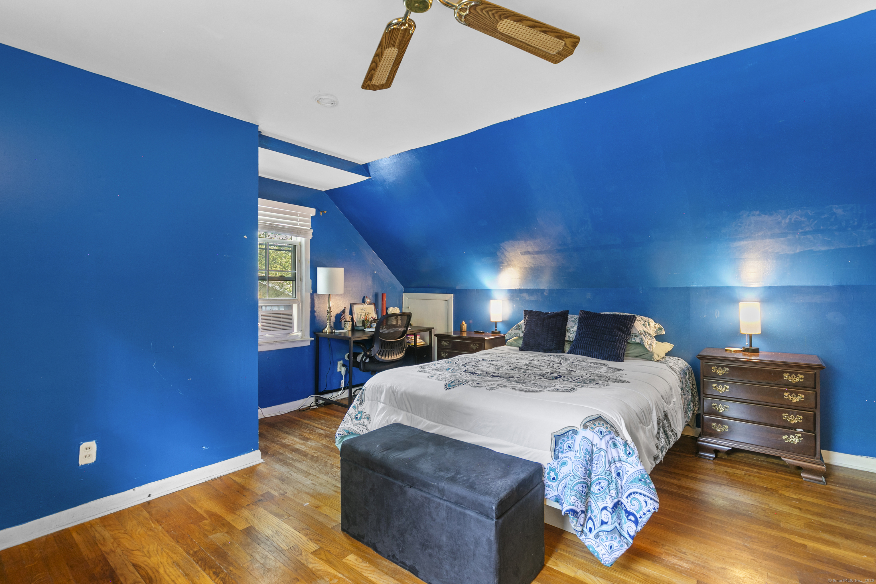 66 Loftus Circle Trumbull, CT 06611 - Photo 24 of 40 a bed sitting in a room next to a window