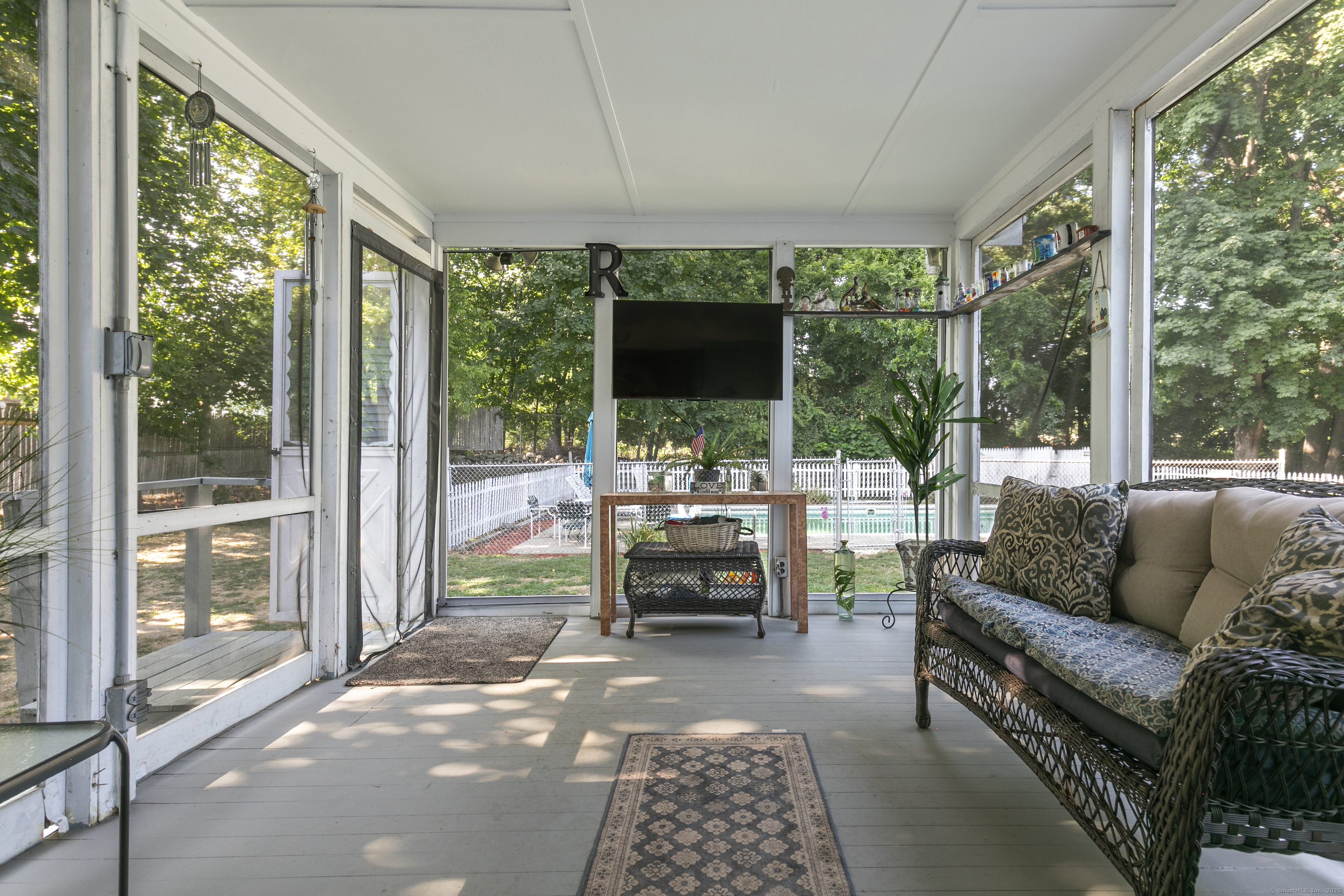 66 Loftus Circle Trumbull, CT 06611 - Photo 33 of 40 a living room with furniture and a flat screen tv