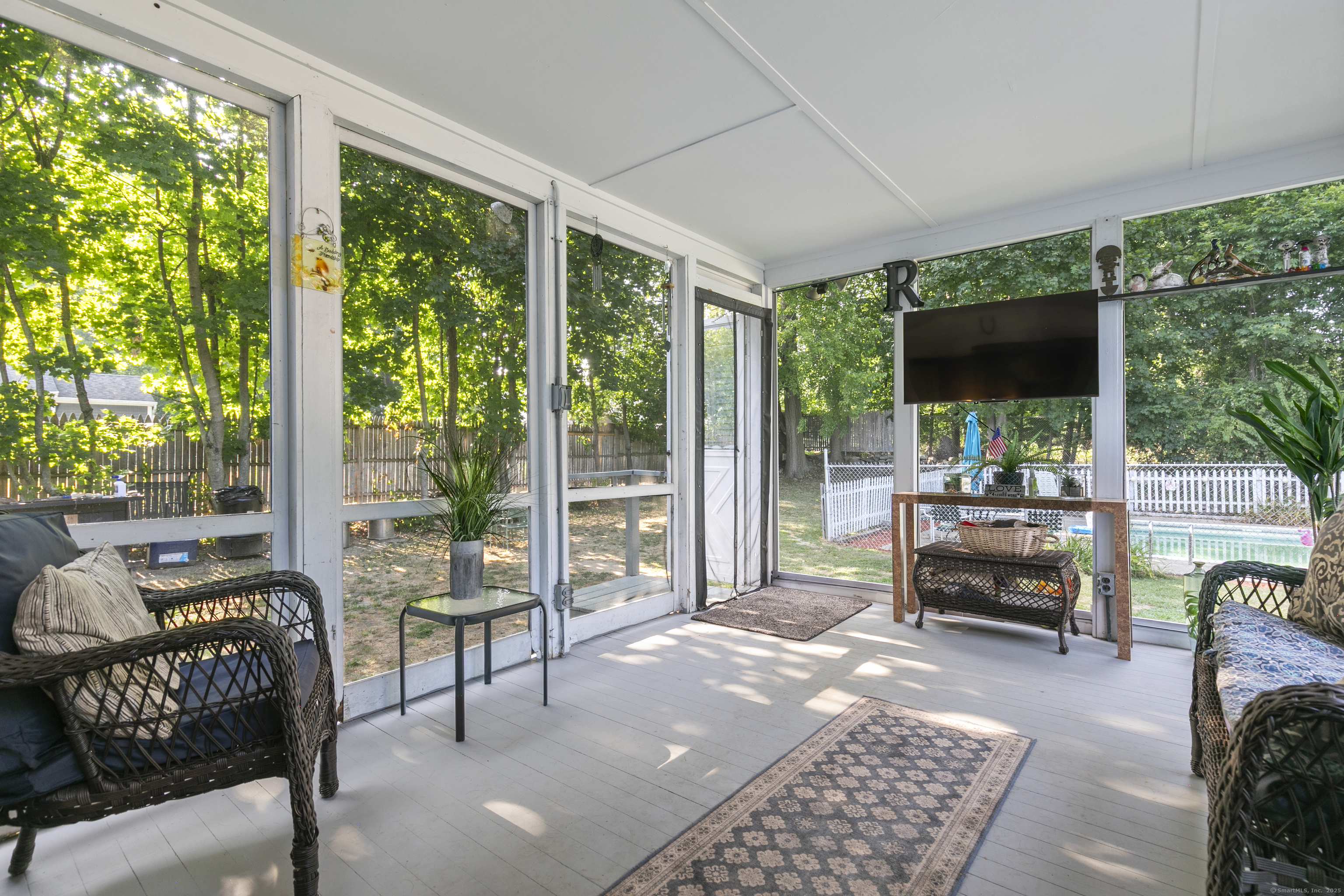 66 Loftus Circle Trumbull, CT 06611 - Photo 34 of 40 a living room with furniture and a flat screen tv