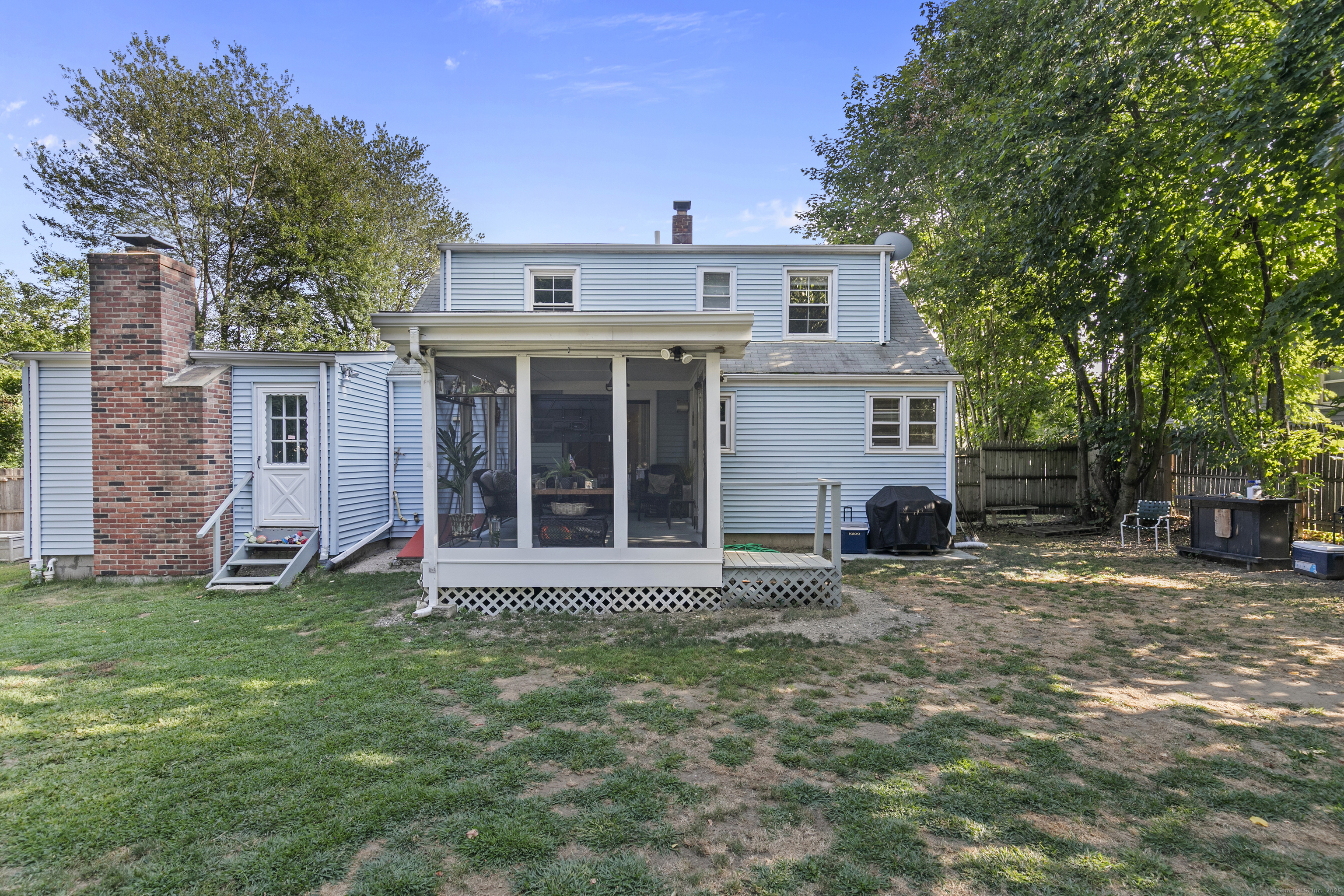 66 Loftus Circle Trumbull, CT 06611 - Photo 35 of 40 a view of a house with a yard and large tree