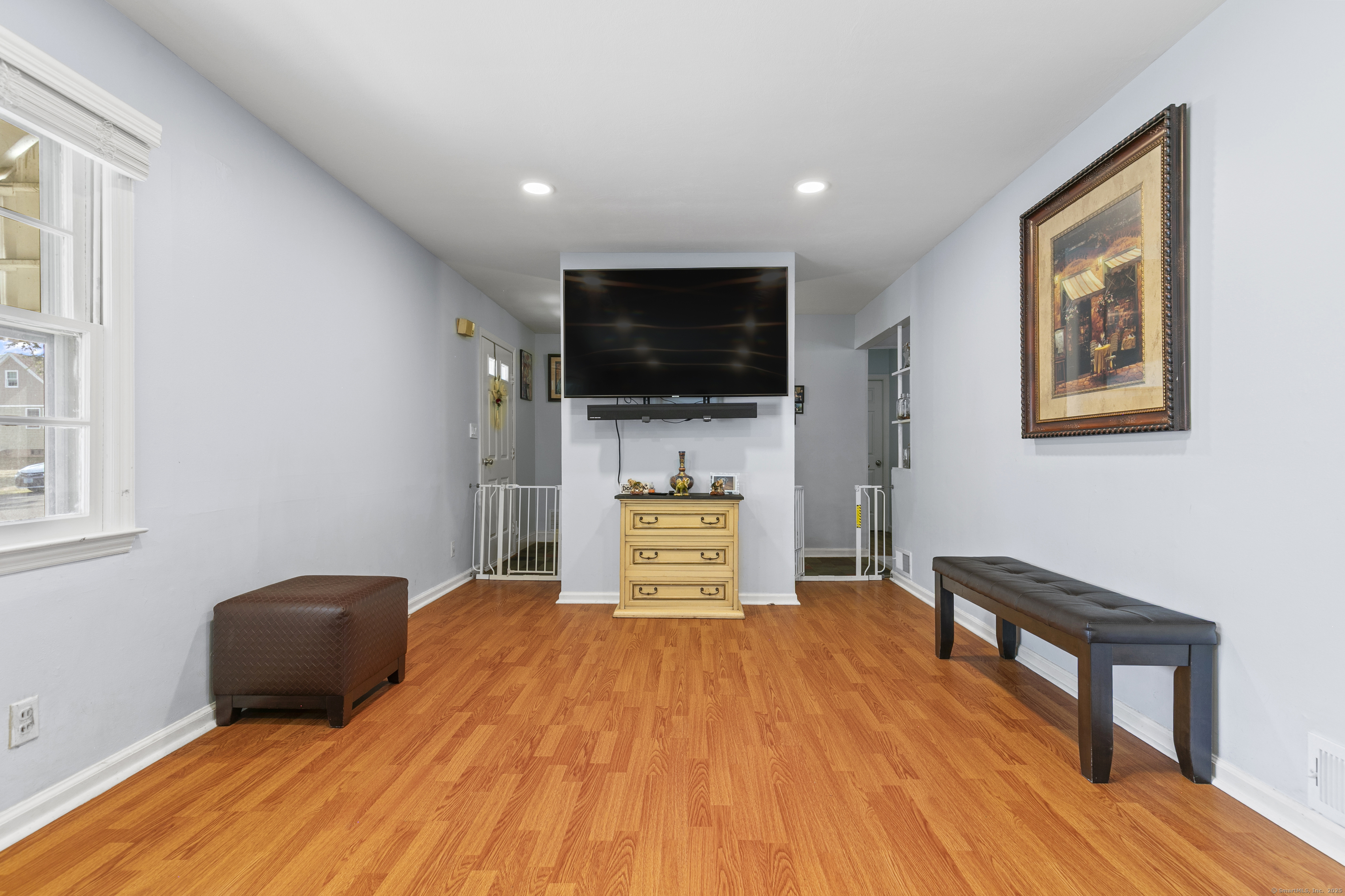 66 Loftus Circle Trumbull, CT 06611 - Photo 4 of 40 a bedroom with a bed and a flat screen tv