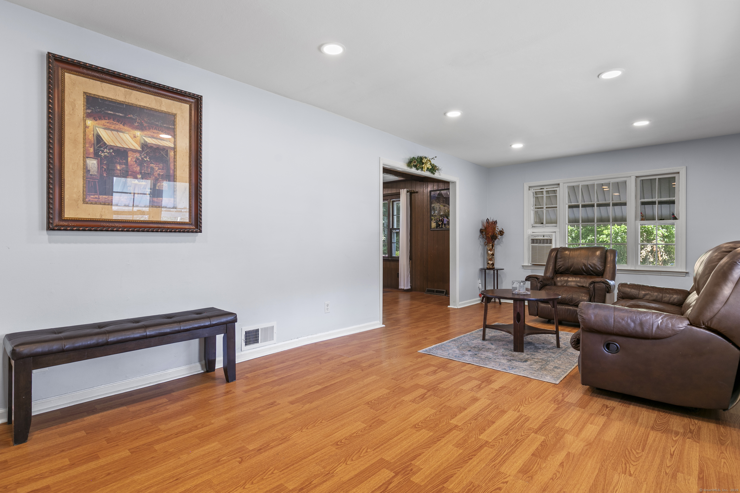 66 Loftus Circle Trumbull, CT 06611 - Photo 5 of 40 a living room with furniture and a wooden floor