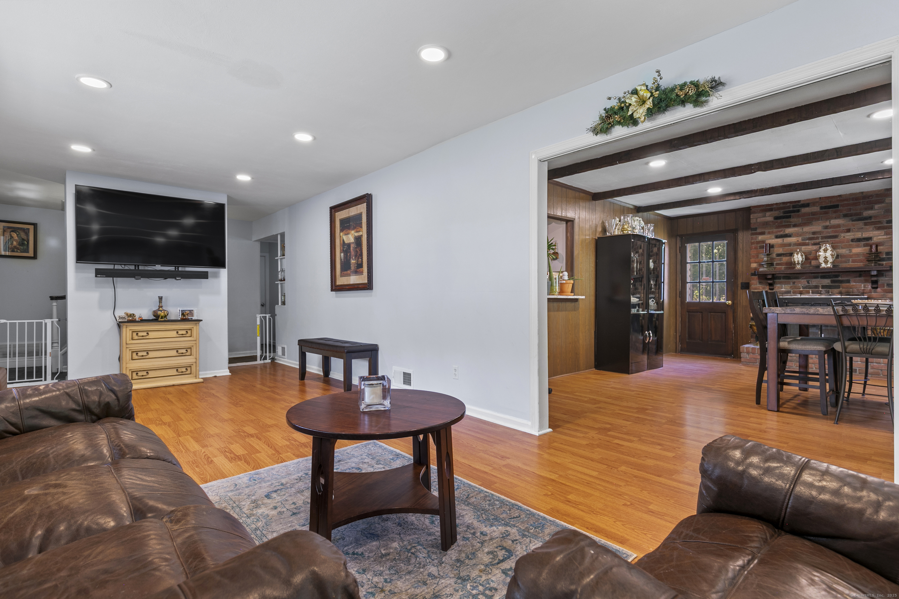 66 Loftus Circle Trumbull, CT 06611 - Photo 6 of 40 a living room with furniture and a flat screen tv
