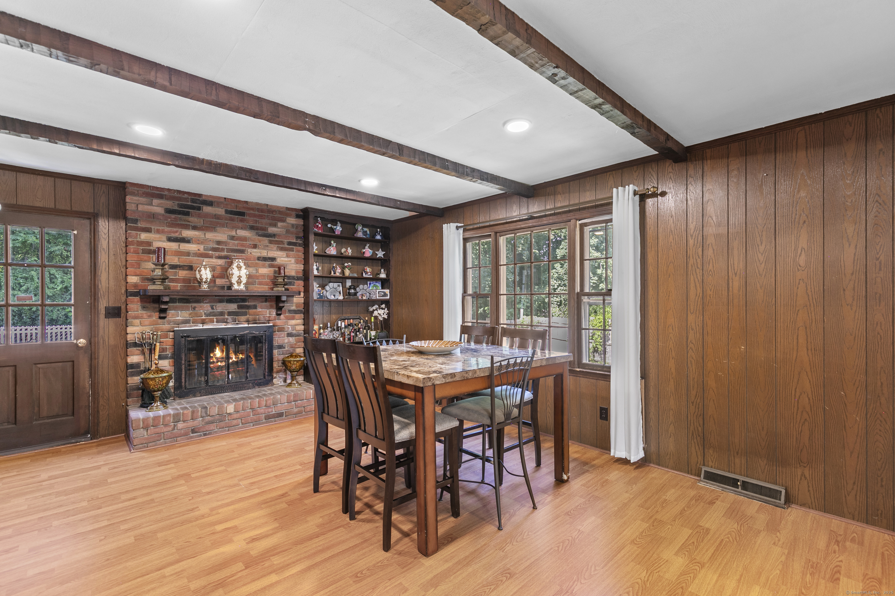 66 Loftus Circle Trumbull, CT 06611 - Photo 8 of 40 a dining room with furniture and wooden floor